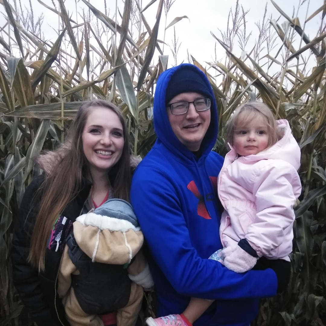 (Photo courtesy of Kaleigh Quick) Pictured is Kaleigh Quick and her husband, Matt, holding their kids.