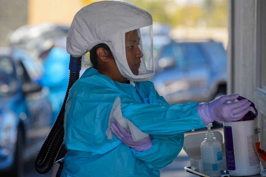 (Trent Nelson  |  The Salt Lake Tribune) Esther Ortiz working at a COVID-19 testing station at Rice-Eccles Stadium in Salt Lake City on Monday, Oct. 12, 2020.