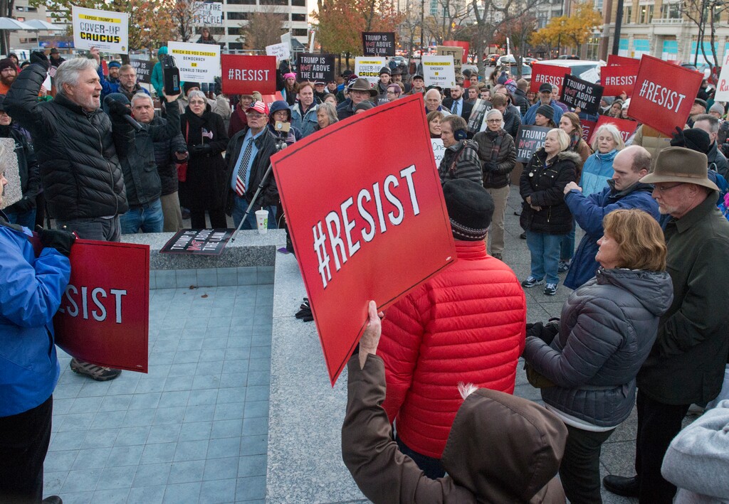 (Rick Egan  |  The Salt Lake Tribune)    Retired judge, Brad Voros gives a speech, as protestors gather at the Federal Building, to demand protection for the Mueller investigation, Thursday, Nov. 8, 2018.