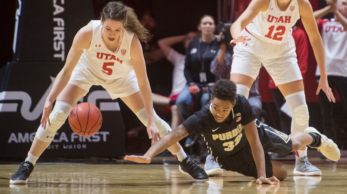 (Rick Egan  |  The Salt Lake Tribune)  Utah Utes center Megan Huff (5) steals the ball from Purdue Boilermakers forward Ae'Rianna Harris (32), in basketball action Utah Utes vs. Purdue Boilermakers, at the Jon M. Huntsman Center, Monday, November 20, 2017.