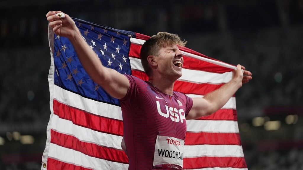 Hunter Woodhall, who grew up in Syracuse, Utah, celebrates after finishing third during the men's T62 400-meter final at Tokyo 2020 Paralympic Games, Friday, Sept. 3, 2021, in Tokyo, Japan. (AP Photo/Emilio Morenatti)