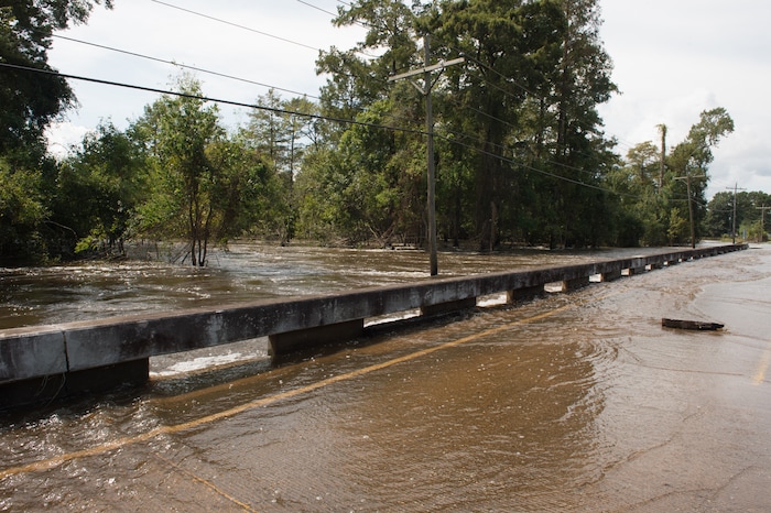 (Rachel Molenda  |  The Salt Lake Tribune) Flooding covers the road across Tiger Creek Bonner Slough in Rose City, Texas, on Tuesday, Sept. 5, 2017. Residents are unable to access their homes, many of which are still under several feet of water more than one week after Hurricane Harvey.