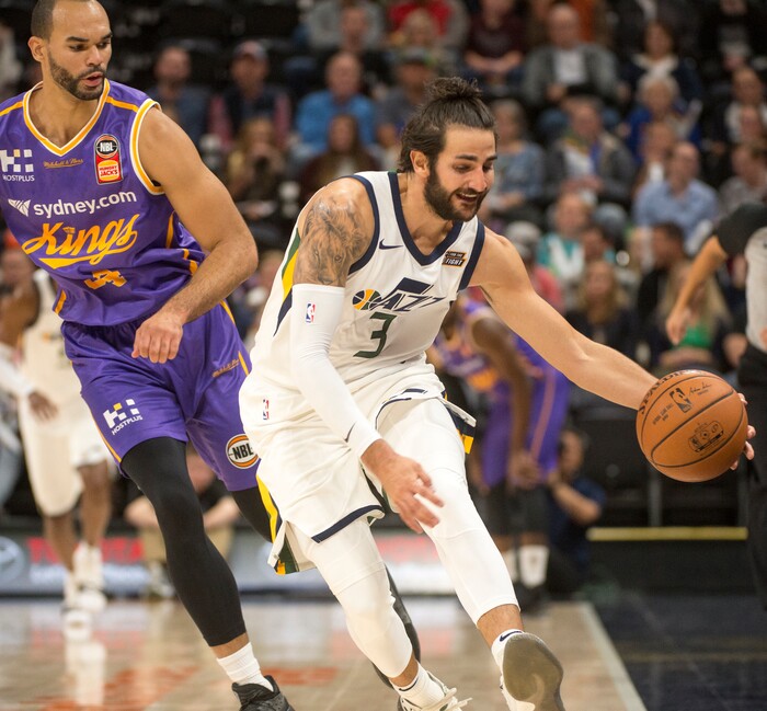 (Rick Egan  |  The Salt Lake Tribune)  Utah Jazz guard Ricky Rubio (3) grabs a loose ball, as Sydney Kings guard Perry Ellis (34) defends, in preseason basketball Utah Jazz vs.Sydney Kings, in Salt Lake City, Sunday, October 2, 2017.


