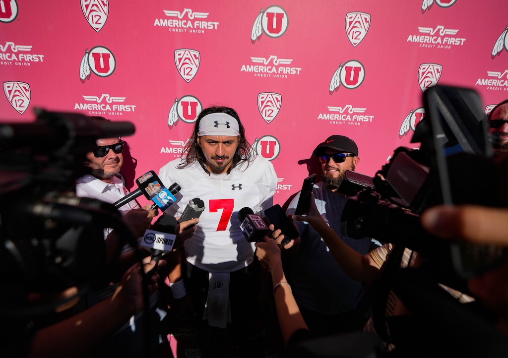 (Francisco Kjolseth | The Salt Lake Tribune) Utah quarterback Cam Rising speaks with the media following practice on Monday Aug. 28, 2023, ahead of last season's opener against Florida.