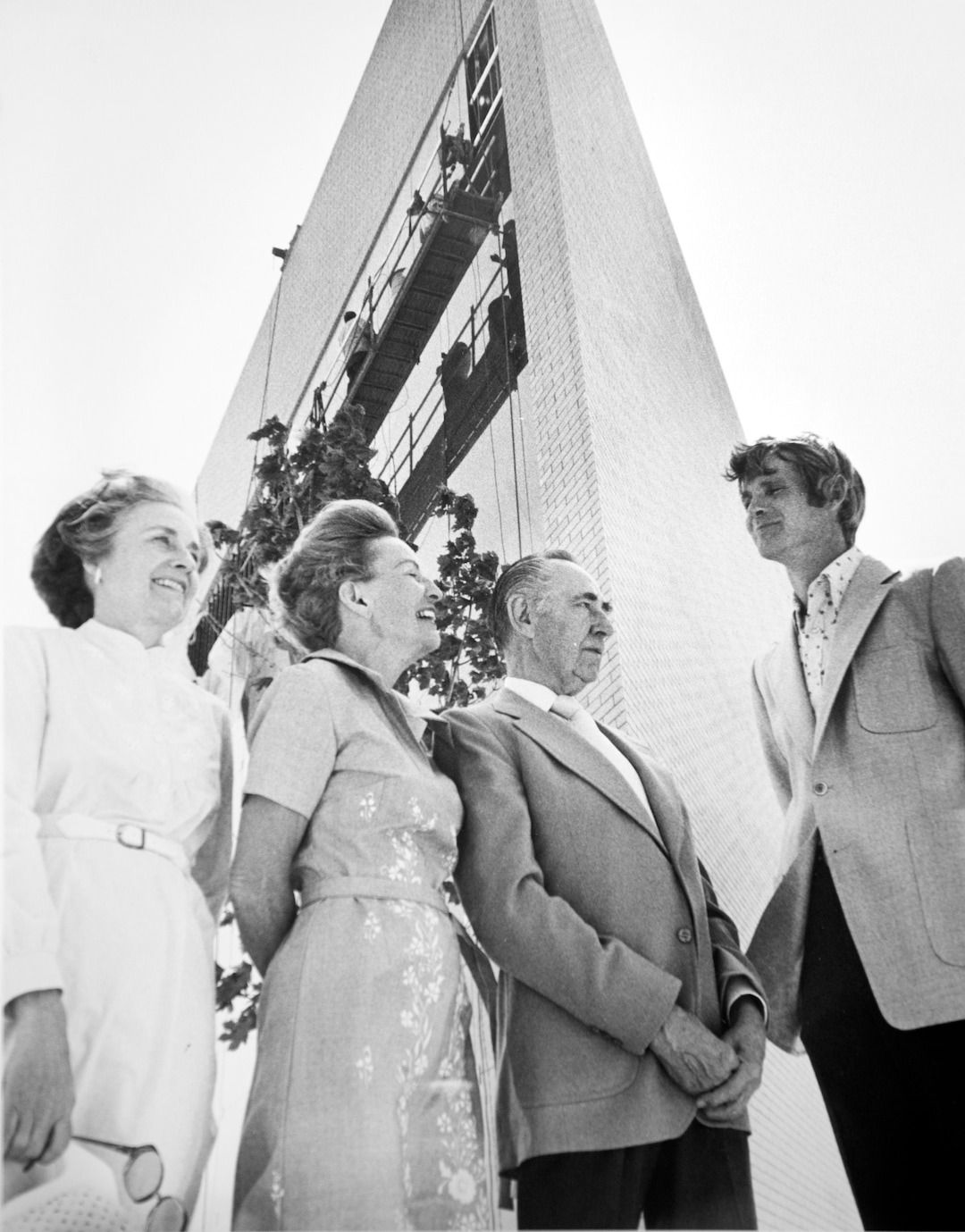 (Photo courtesy of Utah Symphony) Utah Symphony Guild president Barbara Scowcroft, Barbara Tanner, Gordon Weggeland and Scott Gilmore outside Symphony Hall.
