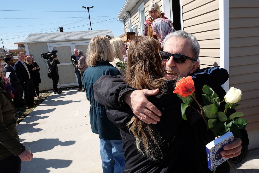 (Francisco Kjolseth  |  The Salt Lake Tribune)  Husam Baker is embraced by Amelia Damarjian as he and other members of the Al Sahaba Mosque in Orem are shown love and support following Friday prayer services in a show of solidarity following the tragic shootings in New Zealand. 