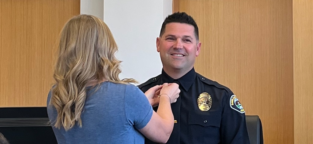 (Santa Clara-Ivins Police Department) New Santa Clara-Ivins police chief Jaron Studley is pinned by his wife, Ashley, when Studley was promoted to lieutenant in 2022.