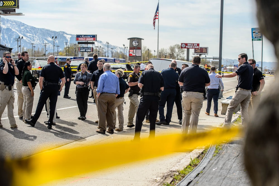 (Trent Nelson  |  The Salt Lake Tribune)  Law enforcement at the scene of a shootout near 3300 South State Street in South Salt Lake on Monday April 8, 2019.
