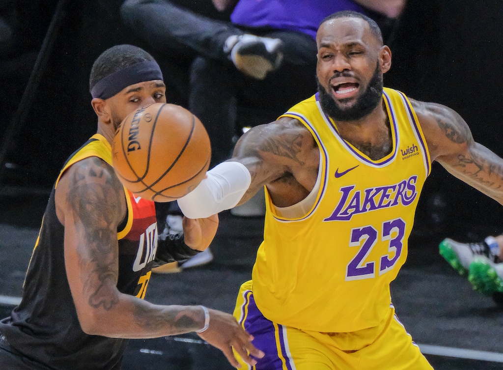 (Leah Hogsten | The Salt Lake Tribune) Utah Jazz forward Royce O'Neale (23) knocks the ball out of Los Angeles Lakers forward LeBron James (23) hands as the Utah Jazz take on the L.A. Lakers, Feb. 24, 2021 at Vivint Arena. 