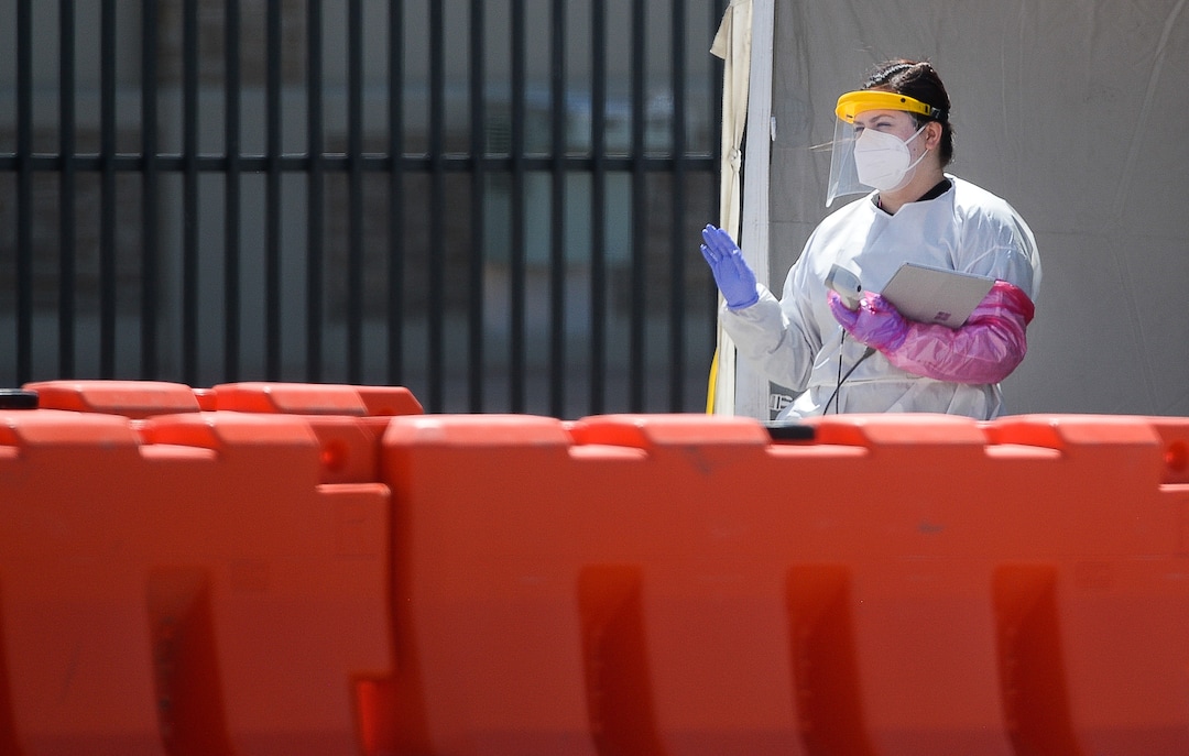 (Francisco Kjolseth | The Salt Lake Tribune) Testing for COVID-19 is performed at the Wasatch County Event Center in Heber City on Wednesday, April 22, 2020, under one of the TestUtah.com contracts the state has with Nomi Health.