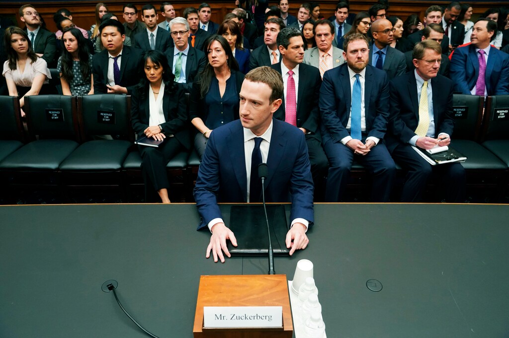 FILE - In this April 11, 2018 file photo, Facebook CEO Mark Zuckerberg arrives to testify before a House Energy and Commerce hearing on Capitol Hill in Washington, about the use of Facebook data to target American voters in the 2016 election and data privacy. For a company bent on making the world more open, Facebook has long been secretive and reluctant to talk about security issues. Yet on Tuesday, July 31 it rushed forward to alert Congress and the media that it had recently detected a small but telling case of election manipulation. While this signals a new openness for the company, there is plenty that Facebook still isn’t saying, and experts wonder whether it’s mere window dressing or a true culture shift.  (AP Photo/Andrew Harnik, File)