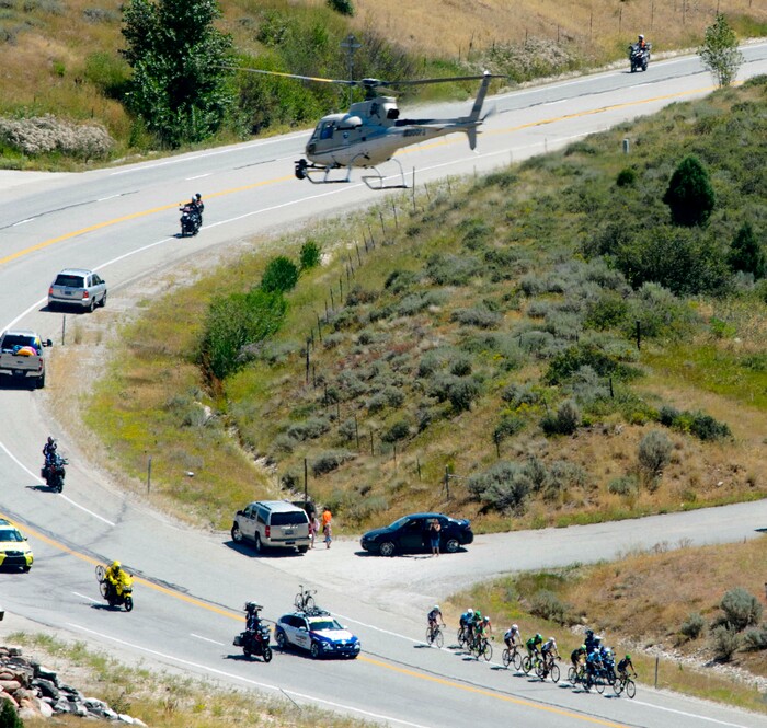 Steve Griffin  |  The Salt Lake TribuneA helicopter, filming the event, hovers over a 10 man breakaway group as they head back up Logan Canyon during Stage 1 of the Tour of Utah bicycle race Monday July 31, 2017. Racers started in Logan and rode around Bear Lake before heading back to Logan for the finish.
