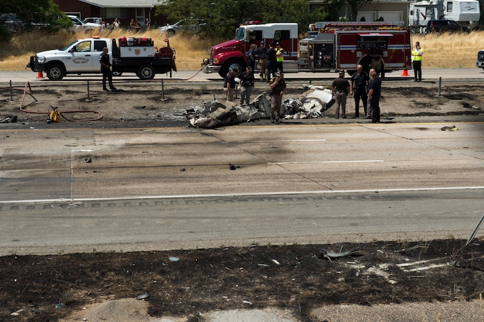 Rick Egan  |  The Salt Lake Tribune

Police investigate the plane crash that killed four people in the median of I-15 freeway, around 1:00pm. The crash closed the freeway to northbound traffic, Wednesday, July 26, 2017.


