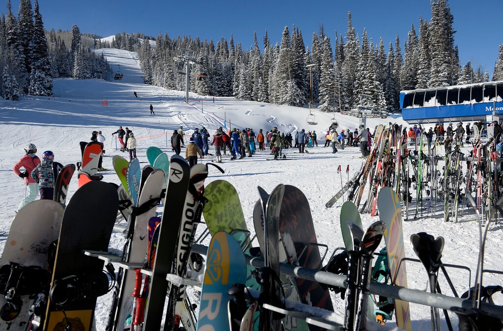 ( Al Hartmann  |  The Salt Lake Tribune file photo ) Racks full of snowboards and skis at Moonbeam lift at Solitude Mountain Resort.
