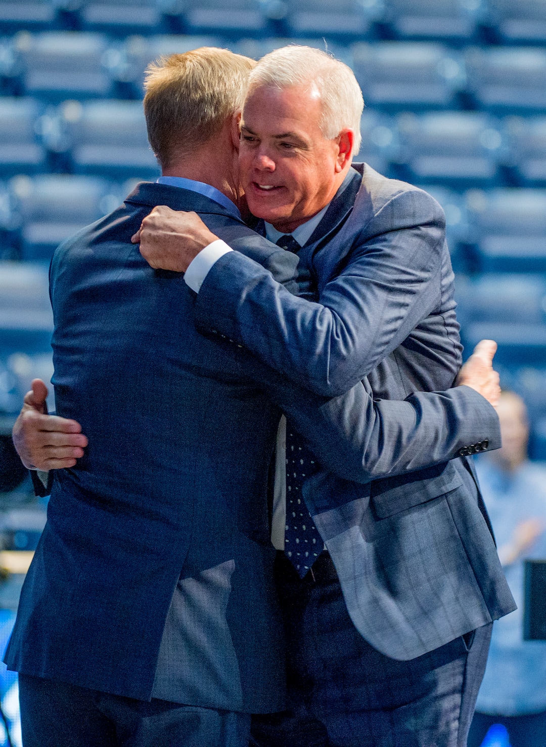 Leah Hogsten  |  The Salt Lake Tribune  BYU coach Dave Rose and BYU athletic director Tom Holmoe embrace before Rose spoke to the media. Dave Rose announced on Tuesday that he was retiring after a 14-year career in which he became BYU's all-time winningest men's basketball coach.