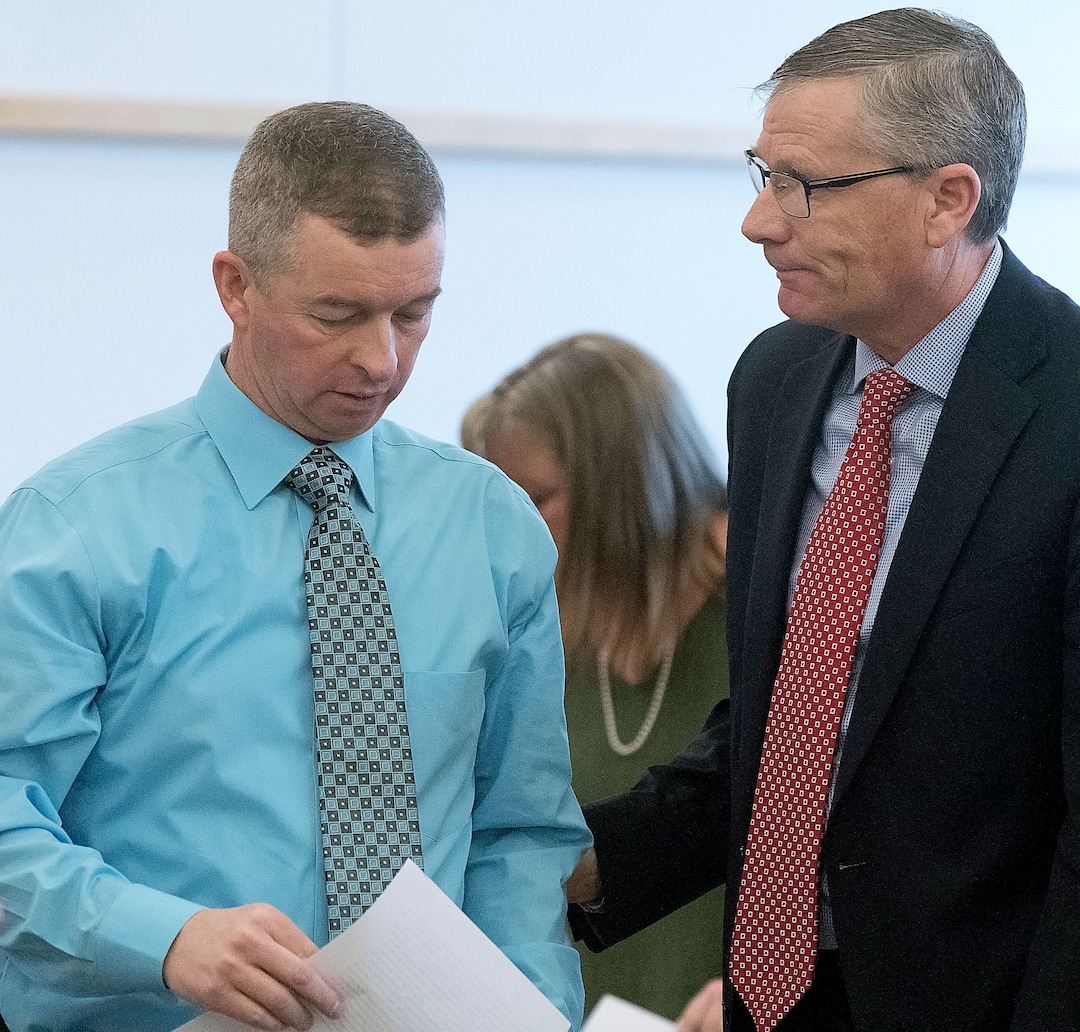 (Eli Lucero  |  Herald Journal, pool) Matt Turner, father of Deserae Turner, talks with prosecuting attorney James Swink during Colter Peterson's sentencing hearing for attempted aggravated murder and robbery, Thursday, Feb. 1, 2018, in Logan, Utah. Peterson received a sentence of 15 years to life for shooting Deserae Turner in February 2017, and leaving her for dead in a dry irrigation canal in Smithfield, Utah.