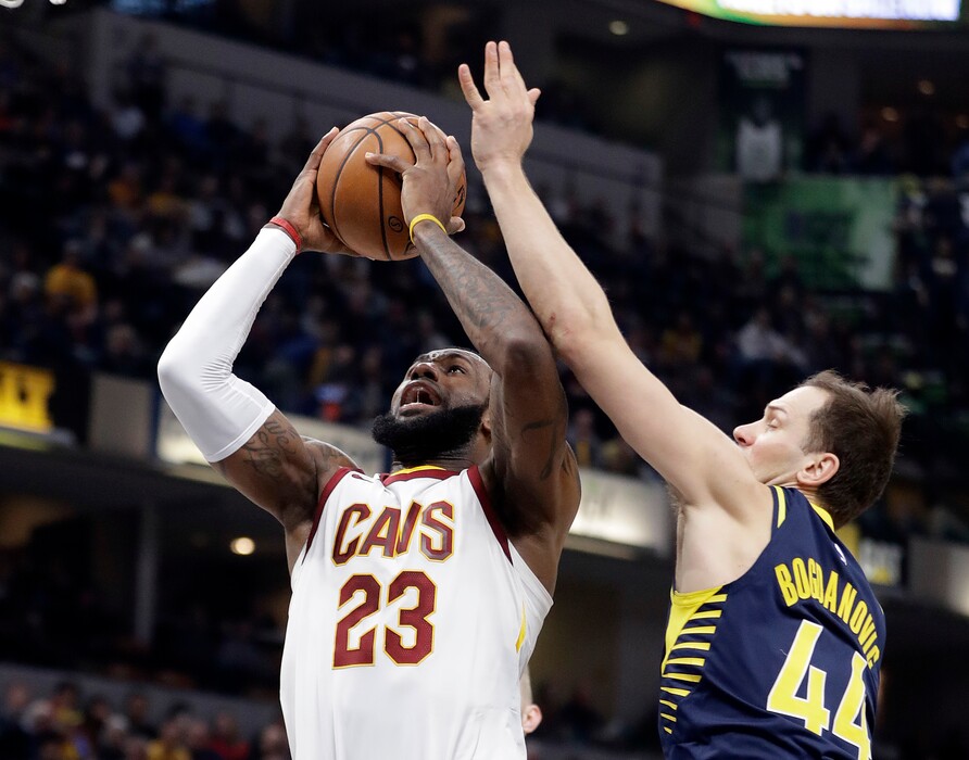 Cleveland Cavaliers' LeBron James (23) shoots against Indiana Pacers' Bojan Bogdanovic during the first half of an NBA basketball game, Friday, Jan. 12, 2018, in Indianapolis. (AP Photo/Darron Cummings)