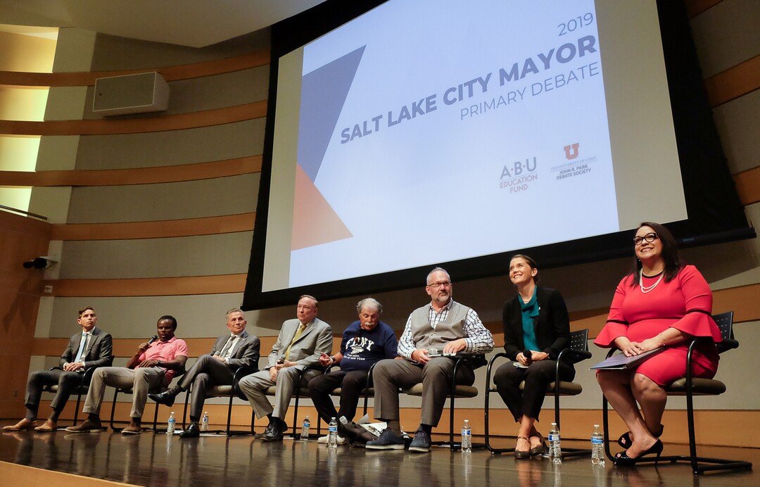 (Francisco Kjolseth  |  The Salt Lake Tribune)  All eight of the candidates for Salt Lake City mayor gather for a debate at the Salt Lake City Library on Wed. June 26, 2019, which includes, from left, David Garbett, Abi Olufeko standing in for Rainer Huck, David Ibarra, Jim Dabakis, Richard Goldberger, Stan Penfold, Erin Mendenhall and Luz Escamilla. The debate was hosted by the ABU Education Fund and the University of Utah’s John R. Park Debate Society and moderated by Averie Vockel.