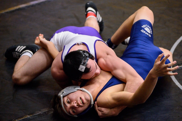 (Trent Nelson | The Salt Lake Tribune)  Box Elder's Brock Hardy pins Woods Cross's Trey Smith, 5A State Championships, high school wrestling quarterfinals in Orem, Wednesday February 7, 2018.