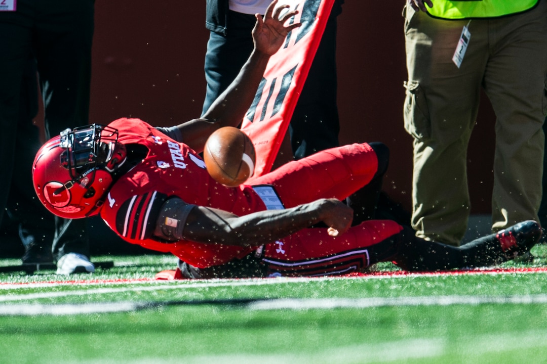 (Chris Detrick  |  The Salt Lake Tribune)  Utah Utes quarterback Tyler Huntley (1) falls to the ground during the game at Rice-Eccles Stadium Saturday, October 21, 2017. 