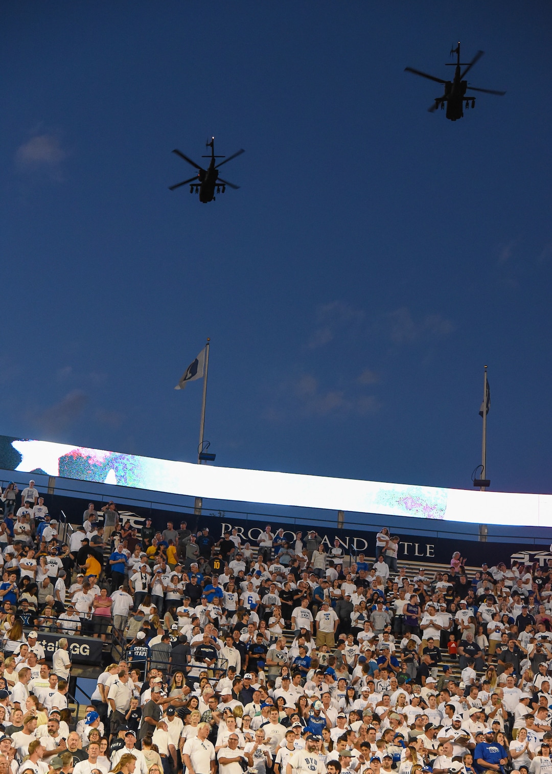 (Francisco Kjolseth  |  The Salt Lake Tribune)  Black Hawk helicopters pass the stadium at the start of the BYU California game during the NCAA college football game, Saturday, Sept. 8, 2018, at LaVell Edwards stadium in Provo, Utah.