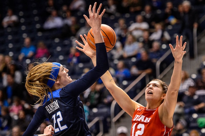 (Trent Nelson | The Salt Lake Tribune)  Brigham Young Cougars center Sara Hamson (22) blocks a shots by Utah Utes forward Emily Potter (12) as BYU hosts Utah, NCAA women's basketball in Provo, Saturday December 9, 2017.