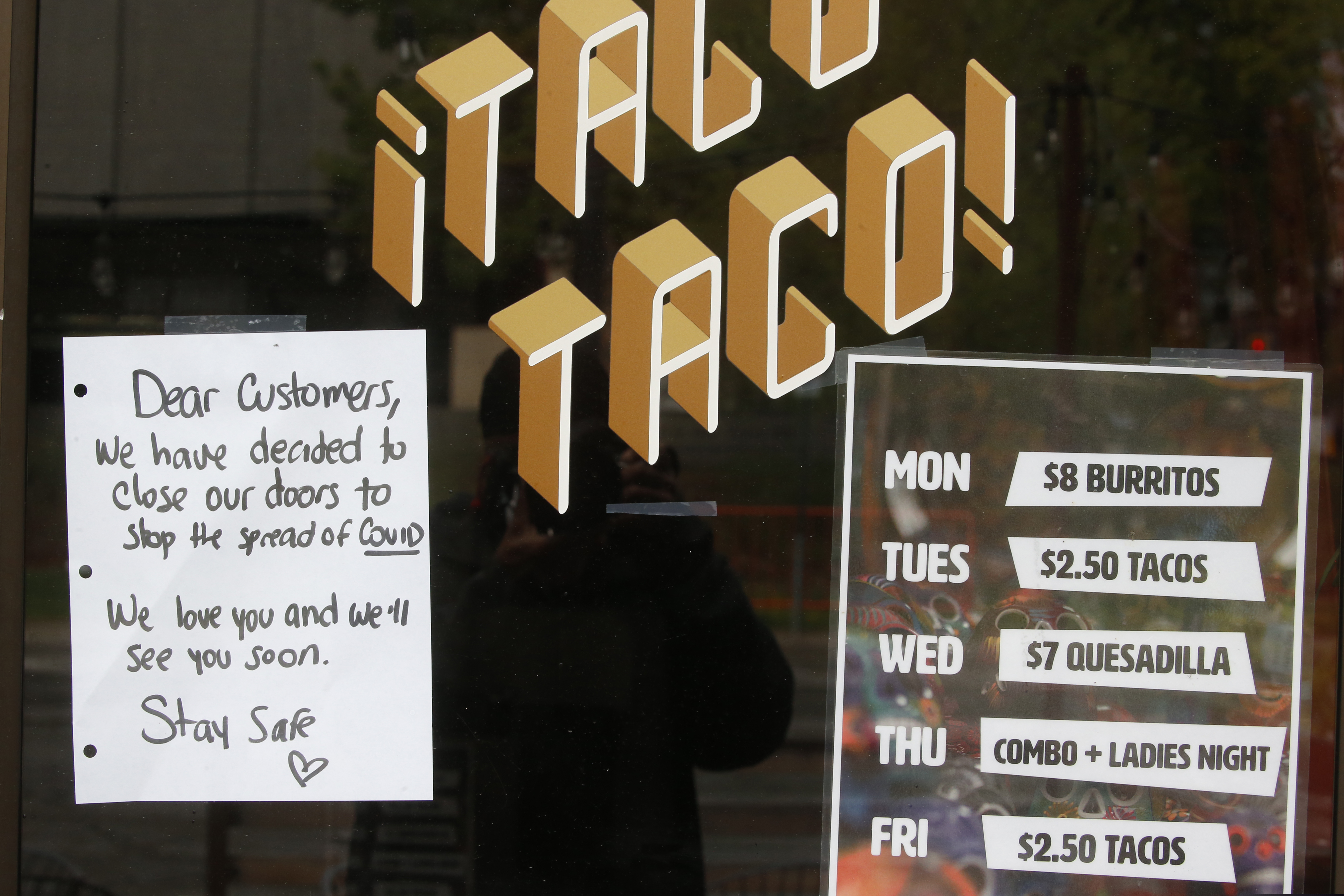 (Rick Bowmer | AP) A sign is taped to the door of Taco Taco Thursday, April 23, 2020, in Salt Lake City. Unemployment slowed somewhat again in Utah last week, but jobless claims remained crushingly high during the coronavirus pandemic that's dealt a body blow to the economy, state officials said.