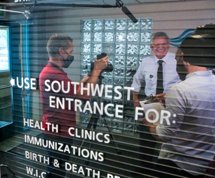 (Leah Hogsten | The Salt Lake Tribune)  Dr. Edward Redd, center, with the Bear River Health Department is filmed by two filmakers with Penna Powers ad agency May 11, 2021 for public service announcements to encourage Utahns to get the COVID-19 vaccine.