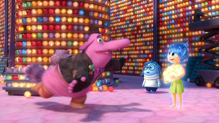 (Courtesy Disney/Pixar) Bing Bong (left, voiced by Richard Kind), the onetime imaginary friend of Riley, encounters Sadness (center, voiced by Phyllis Smith) and Joy (right, voiced by Amy Poehler) in Riley's long-term memory, in a scene from the 2015 Disney/Pixar tale "Inside Out."
