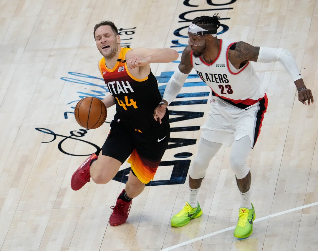 (Francisco Kjolseth | The Salt Lake Tribune) Utah Jazz forward Bojan Bogdanovic (44) is fouled by Portland Trail Blazers forward Robert Covington (23) in NBA action between the Utah Jazz and the Portland Trail Blazers, at Vivint Smart Home Arena, on Wednesday, May 12, 2021.