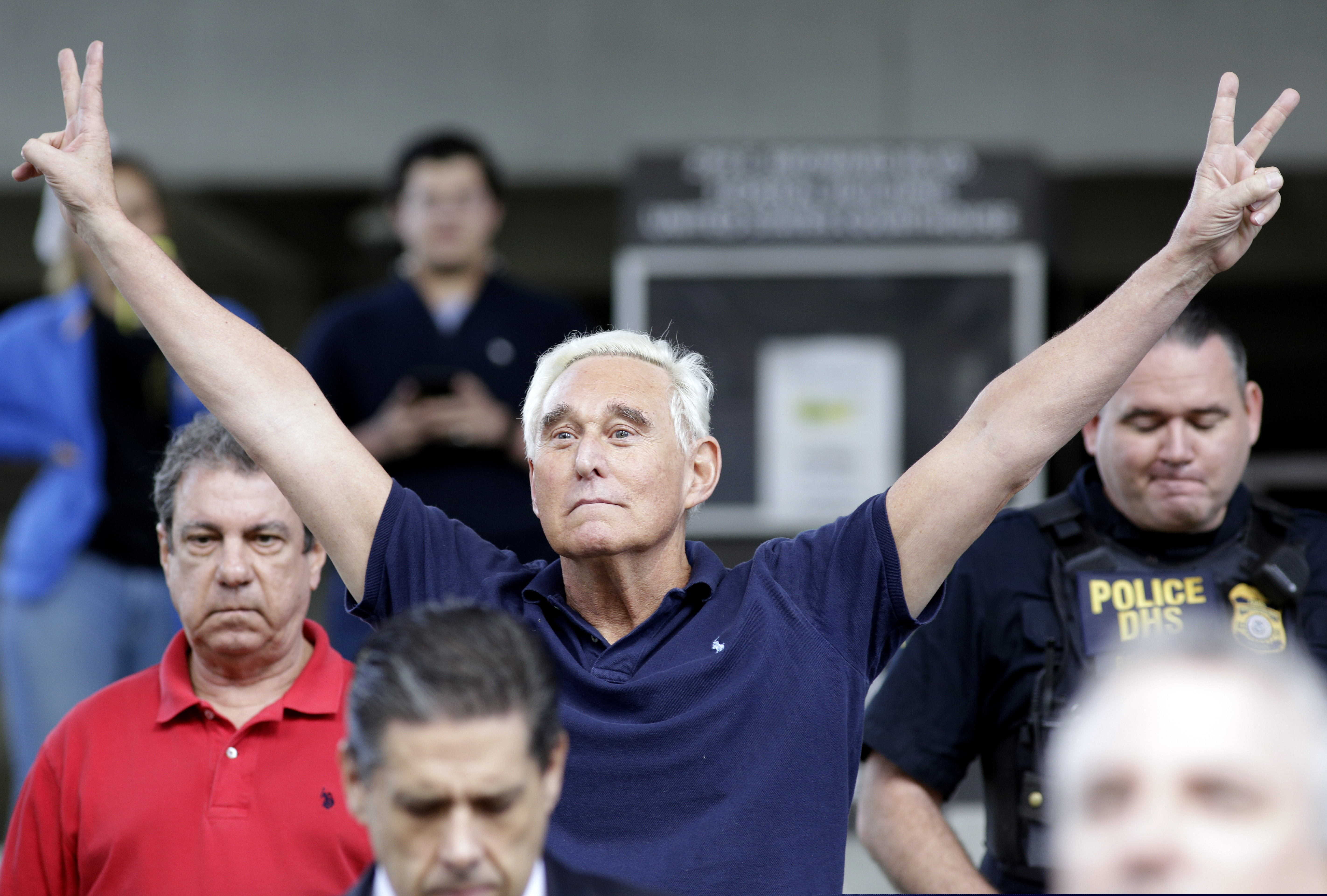 Former campaign adviser for President Donald Trump, Roger Stone walks out of the federal courthouse following a hearing, Friday, Jan. 25, 2019, in Fort Lauderdale, Fla. Stone was arrested Friday in the special counsel's Russia investigation and was charged with lying to Congress and obstructing the probe. (AP Photo/Lynne Sladky)