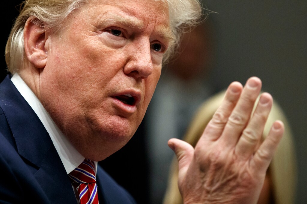 (AP Photo/Evan Vucci) In this Feb. 22, 2018, photo, President Donald Trump speaks during a meeting with state and local officials to discuss school safety in the Roosevelt Room of the White House in Washington.