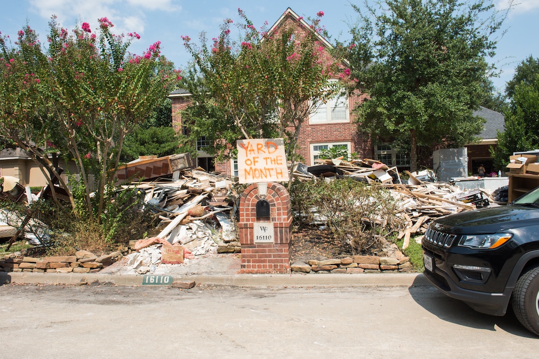 (Rachel Molenda  |  The Salt Lake Tribune) Residents of Wimbledon Estates in Spring, Texas, pile belongings and the interior of homes in yards following Hurricane Harvey. Members of the LDS Church in Houston were in the neighborhood assisting resideints with cleanup after Hurricane Harvey on Sunday, Sept. 3, 2017.