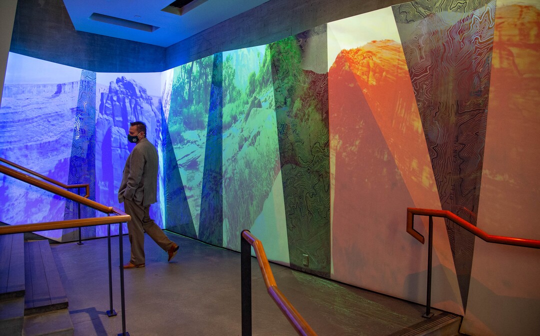 (Francisco Kjolseth  |  The Salt Lake Tribune) Jason Cryan, who became the new director of the Natural History Museum of Utah in March, gives a tour of updates that have been made to the museum entrance installation by Susan Narduli. Cryan hopes to reopen the museum in mid-August.