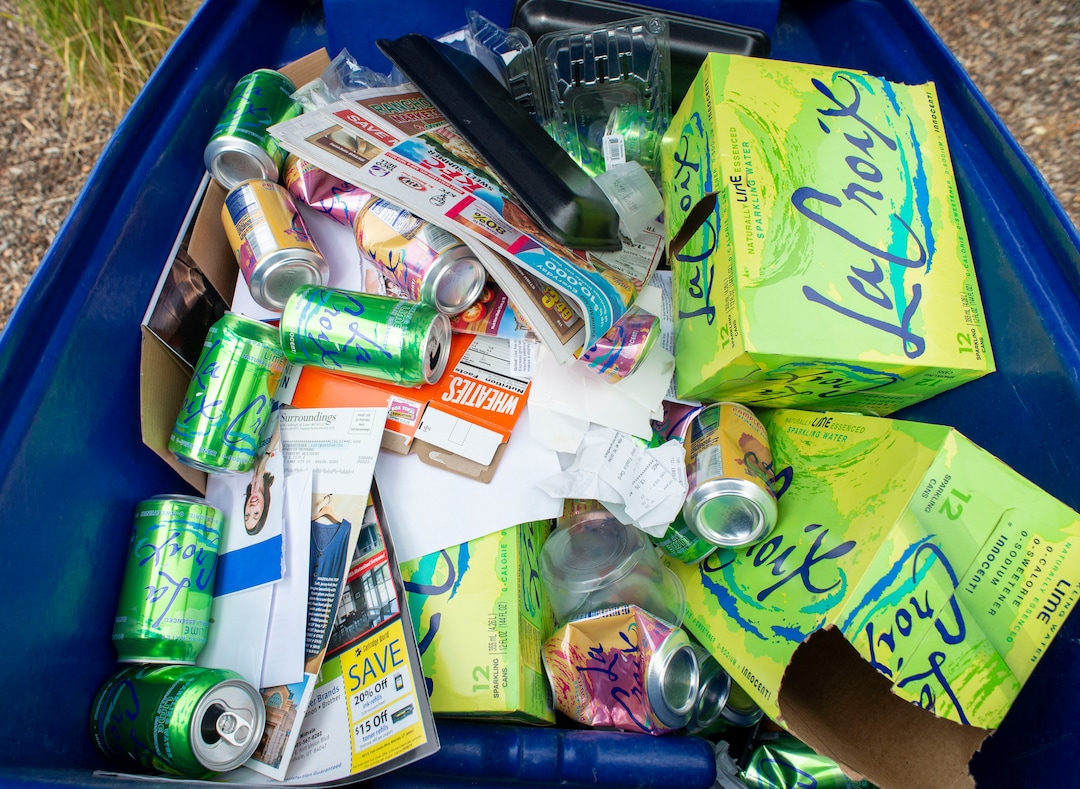 (Rick Egan  |  The Salt Lake Tribune) Material to be recycled in a bin in Sugarhouse, waiting for the Wasatch Front Waste and Recycling District to pick up on Friday, July 26, 2019.