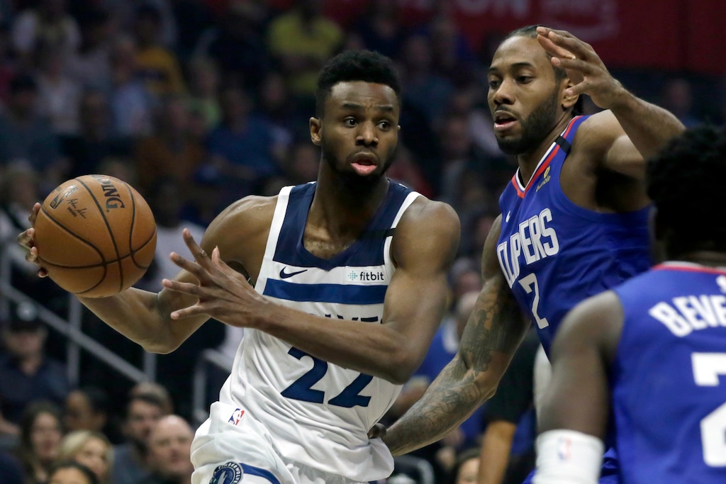 Minnesota Timberwolves guard Andrew Wiggins, left, drives to the basket again Los Angeles Clippers forward Kawhi Leonard (2) during the first half of an NBA basketball game in Los Angeles, Saturday, Feb. 1, 2020. (AP Photo/Alex Gallardo)