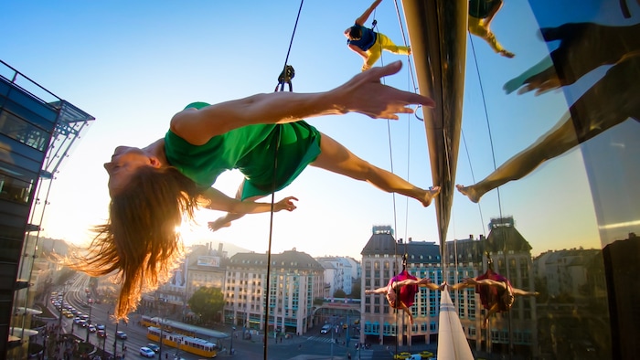 (Photo courtesy of BANDALOOP) Oakland, Calif.-based “vertical dance” company BANDALOOP will be appearing at the Utah Arts Festival June 21-24, and will perform twice daily (5:30 and 7 p.m.) on the six-story library glass wall above the reflecting pool.