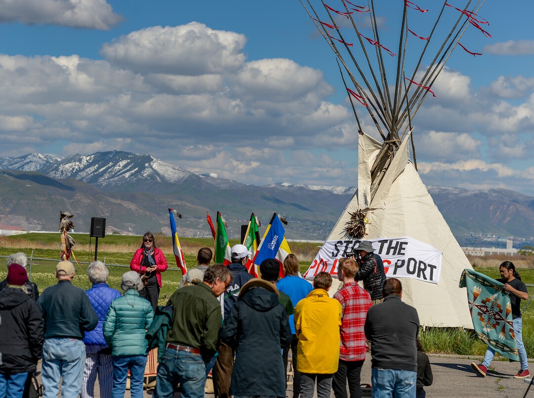 Leah Hogsten  |  The Salt Lake Tribune  Deeda Seed, a senior campaigner with the Center for Biological Diversity welcomes the crowd, near the dump site on 7200 West and I-80.. The "Stop the Polluting Port" community coalition staged a May Day celebration, calling for respect and awareness of the water, earth and air regarding the 20,000 acres west of Salt Lake City where the inland port industrial site has been proposed.