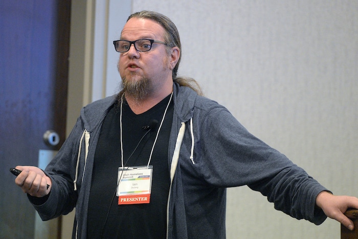 (Al Hartmann  |  The Salt Lake Tribune) 	
Homelessness advocate, educator, Iain De Jong speaks at a breakout session to Utah homeless service providers at Utah's 14th Annual Homelessness Summit in Salt Lake City Wednesday Oct. 11.  He spoke on housing-focused services in shealter and when to encourage self resolution.  