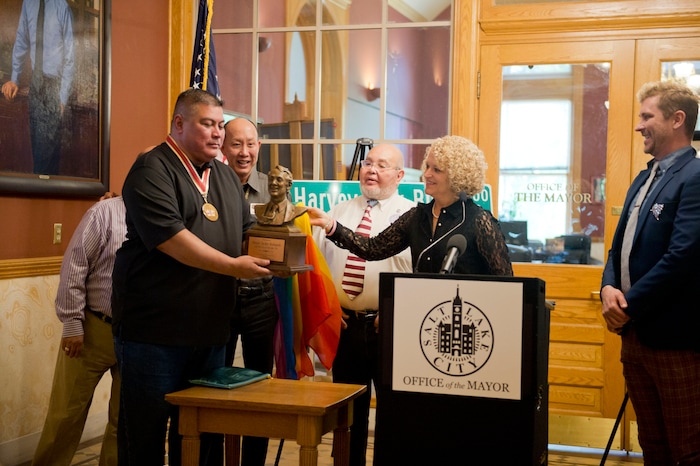 (Rachel Molenda | The Salt Lake Tribune)
Salt Lake City Mayor Jackie Biskupski, second from right, unveils a bust of gay rights activist Harvey Milk after she was given the Harvey Milk Civil Rights Award by the International Imperial Court at the Salt Lake City-County Building in Salt Lake City, Utah, on Friday, May 25, 2018.