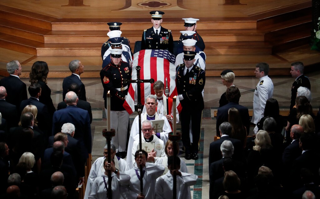 (AP Photo/Pablo Martinez Monsivais) The casket of Sen. John McCain, R-Ariz., is carried during the recessional at the end of a memorial service at Washington National Cathedral in Washington, Saturday, Sept. 1, 2018. McCain died Aug. 25, from brain cancer at age 81.
