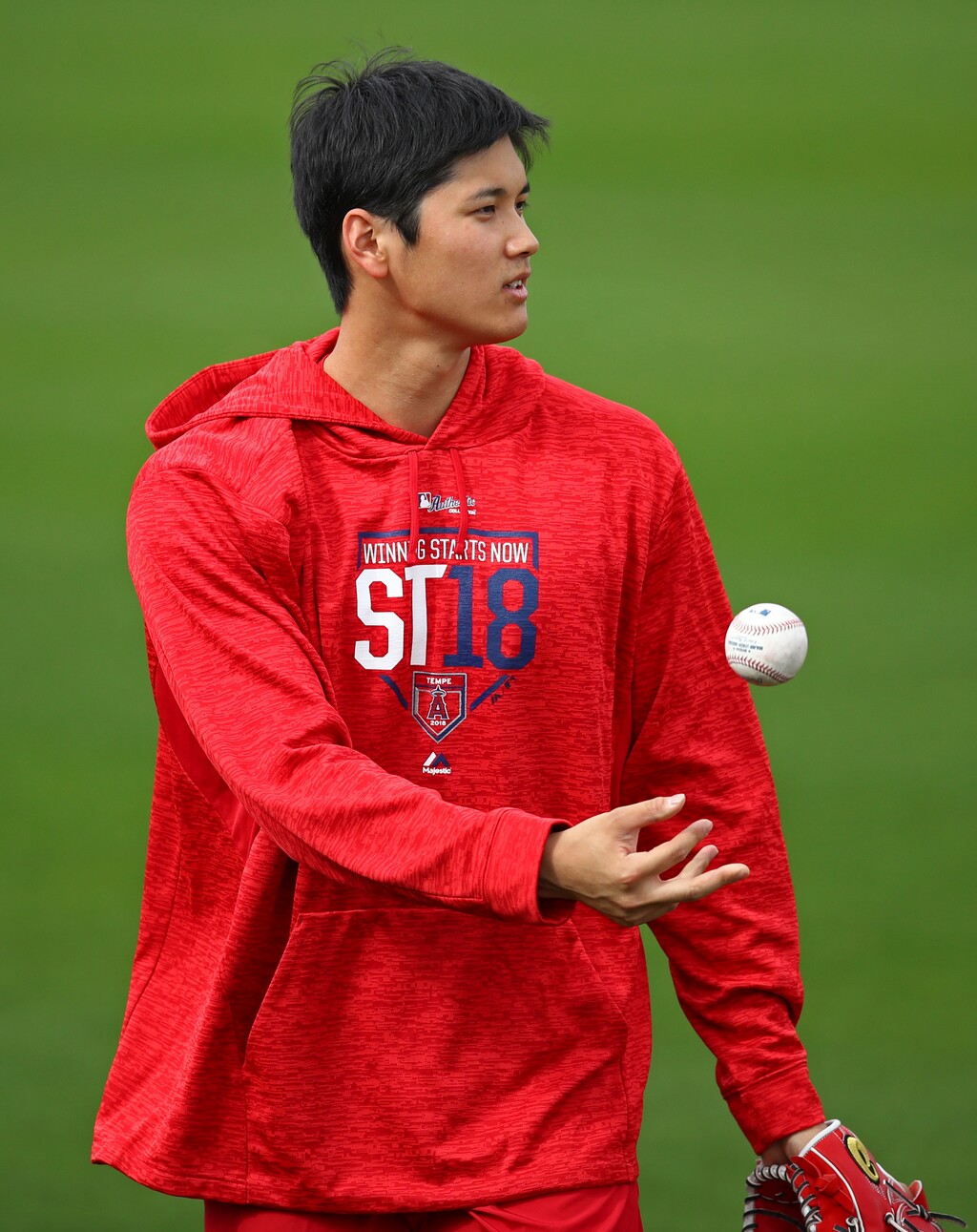 Shohei Ohtani reports to Angels with physical, swings and long toss