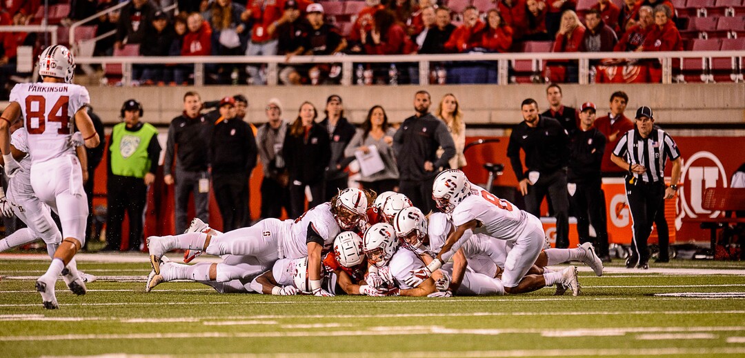(Trent Nelson | The Salt Lake Tribune)  Utah and Stanford players dive for an onside kick in the final minute as the University of Utah hosts Stanford, NCAA football at Rice-Eccles Stadium in Salt Lake City Saturday October 7, 2017.