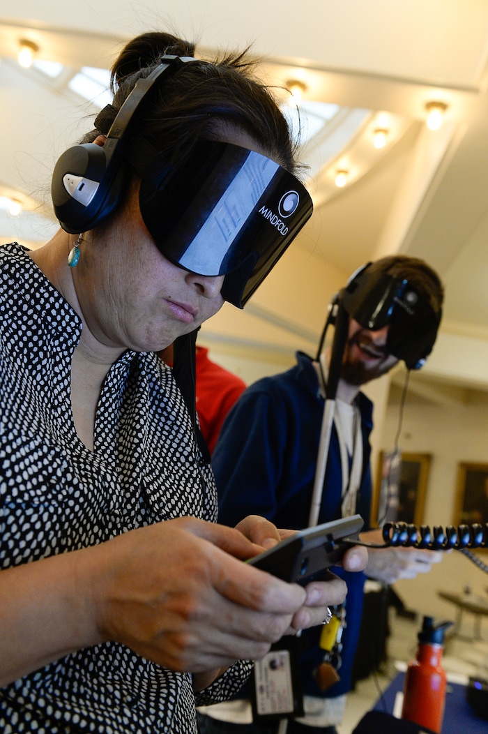 (Francisco Kjolseth  |  The Salt Lake Tribune)  Chanar Goodrich of Ogden takes advantage of an invitation to try five new voting machines by different manufacturers including Election Systems & Software that can accommodate the visually impaired. Companies demonstrated new voting machines that the state is considering buying during a hands on presentation at the Capitol on Wednesday, Aug. 2, 2017.