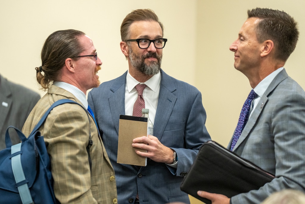 (Rick Egan | The Salt Lake Tribune) Greg Peterson, left, president of Salt Lake Community College, speaks with Utah System of Higher Education Commissioner Geoff Landward, center, and Weber State University President Brad Mortensen, at the Capitol on Tuesday, Aug. 19, 2025.