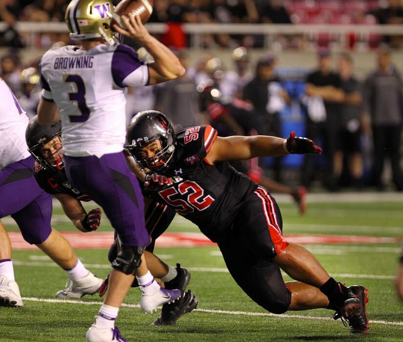 Photo courtesy of University of Utah Athletics |Utah defensive tackle John Penisini hurries Washington quarterback during Pac-12 game on Sept. 15 at Rice-Eccles Stadium