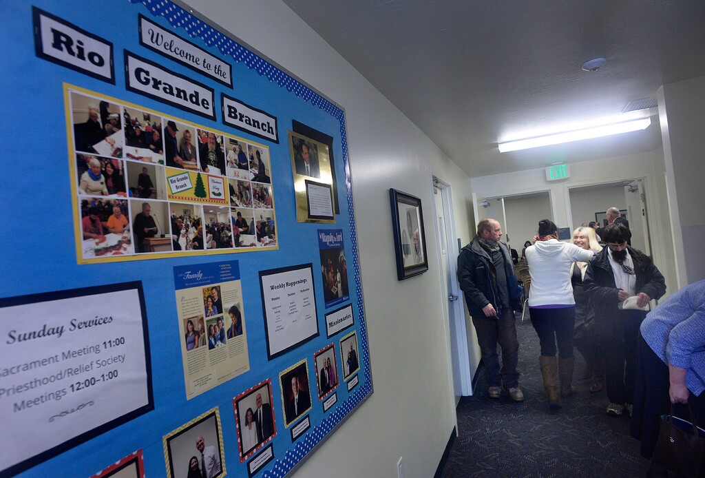 (Scott Sommerdorf | The Salt Lake Tribune) Sacrament meeting ends after a Latter-day Saint service for the homeless at what was then called the Rio Grande Branch in Salt Lake City in 2017. The congregation, now called the Fayette Branch, is one of many ways the church helps unsheltered Utahns.