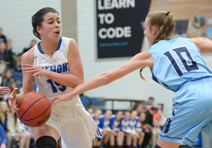 (Leah Hogsten  |  The Salt Lake Tribune)  Fremont's Kallin Freestone (10) knocks the ball away from Westlake's Hailee Anderson (15). Fremont faces Westlake in their semifinal game of the 6A High School Girls' Basketball Tournament at SLCC in Taylorsville, Friday, Feb. 23, 2018. 
