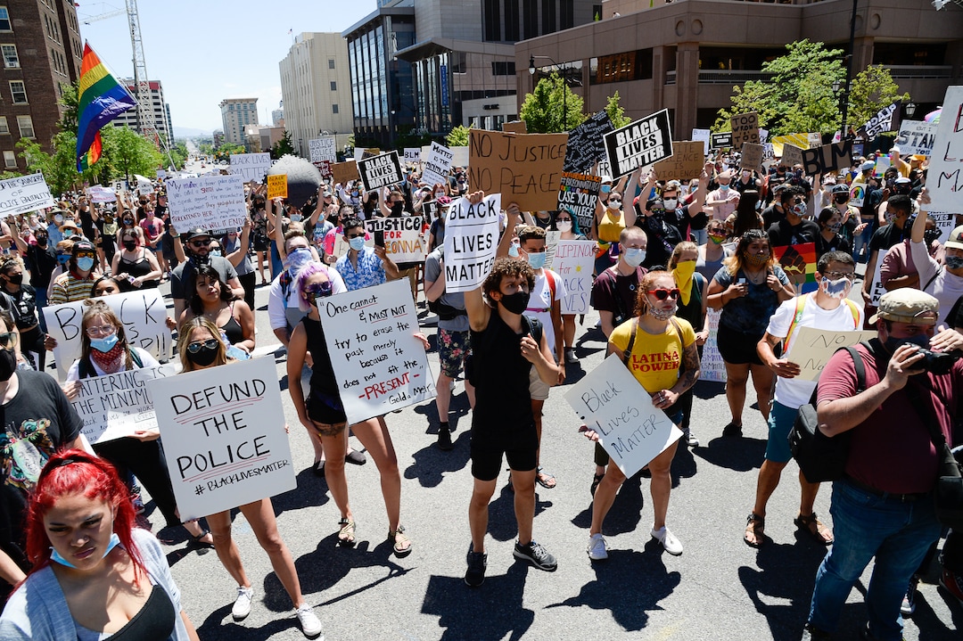 (Francisco Kjolseth  |  The Salt Lake Tribune) Demonstrators march the streets of downtown Salt Lake City for a protest as part of a series of Juneteenth celebrations on Friday, June 19, 2020.