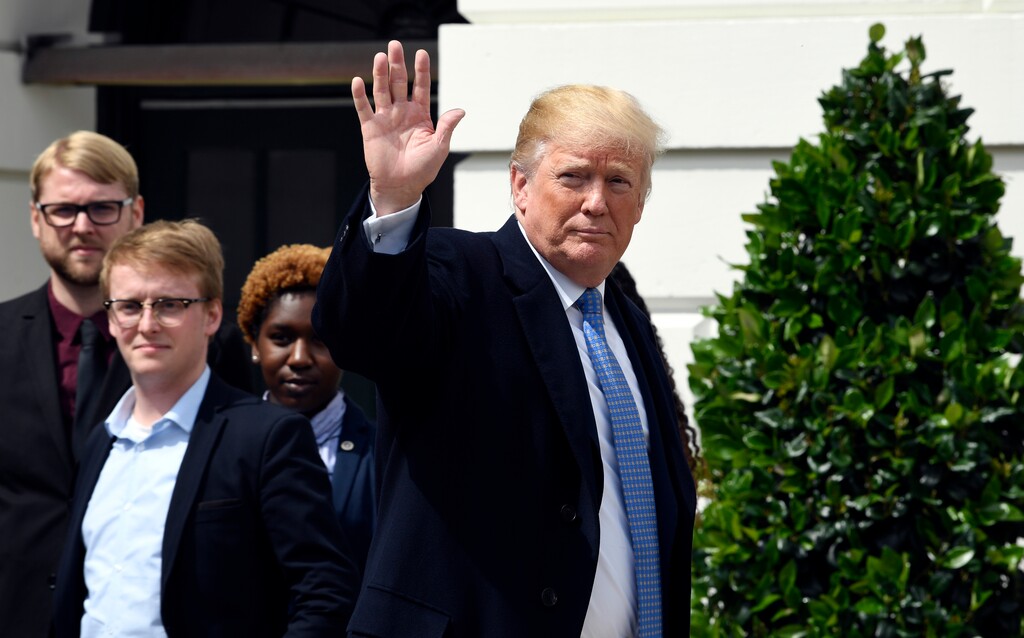 President Donald Trump waves after meeting with the 2018 White House Correspondents' Association Scholarship Winners on the South Portico of the White House in Washington, Friday, April 27, 2018. (AP Photo/Susan Walsh)